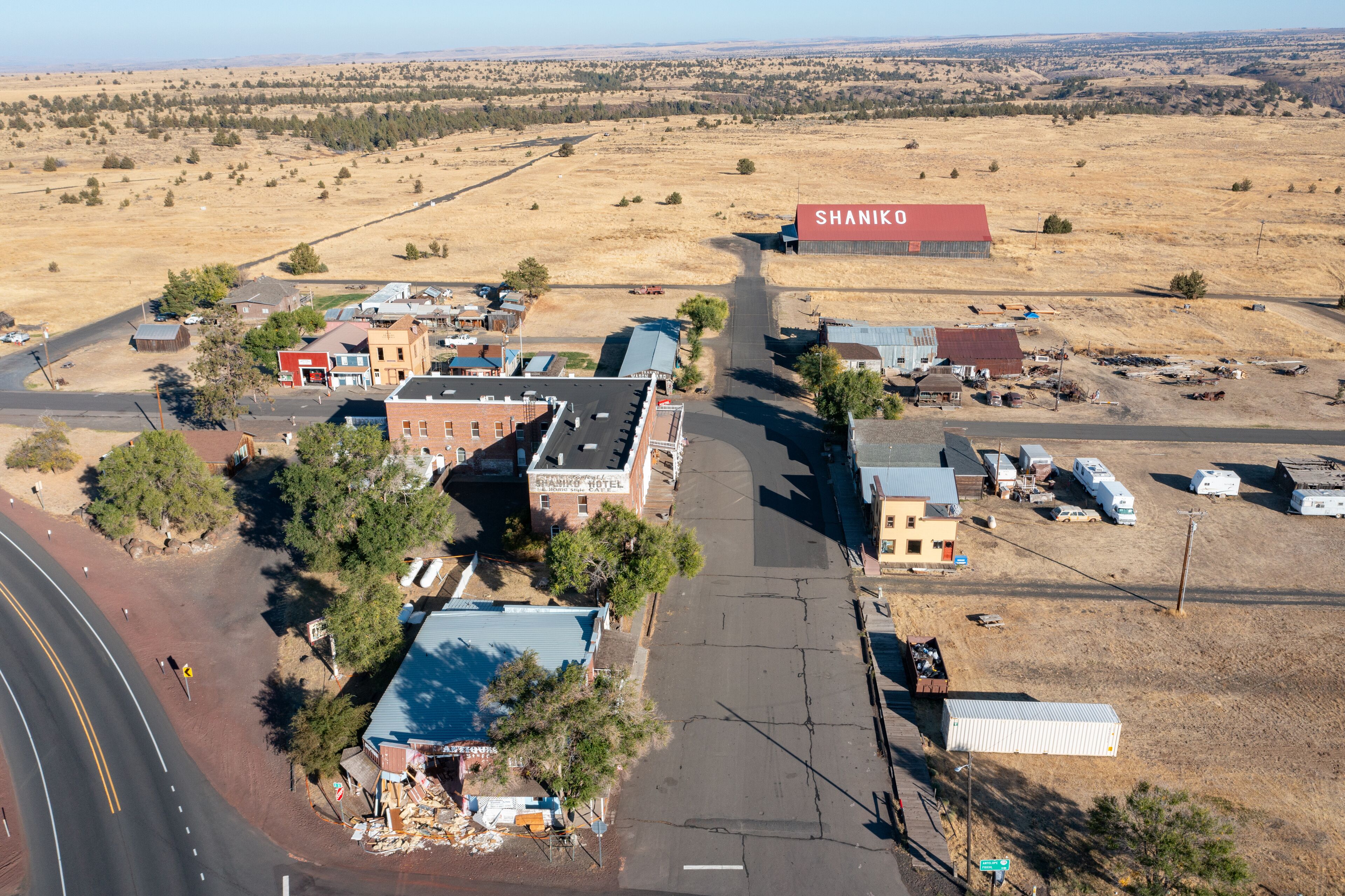 Aerial drone view of the famous ghost town Shaniko in Central Oregon, with abandoned buildings, church and historical shops, hotels etc. High quality picture for download