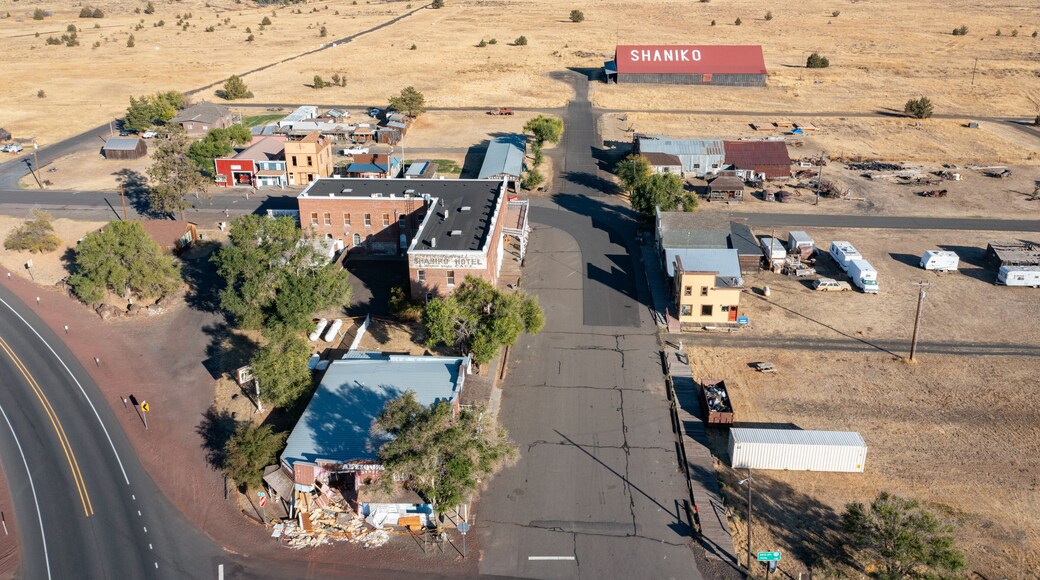Aerial drone view of the famous ghost town Shaniko in Central Oregon, with abandoned buildings, church and historical shops, hotels etc. High quality picture for download