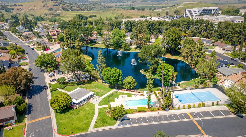 West Hills, LA Los Angeles County, CA, California, April 22, 2024: Aerial Drone City View toward Roscoe Blvd, Woodlake Ave, Lees Lake with Homes, Houses, Apartments, Streets