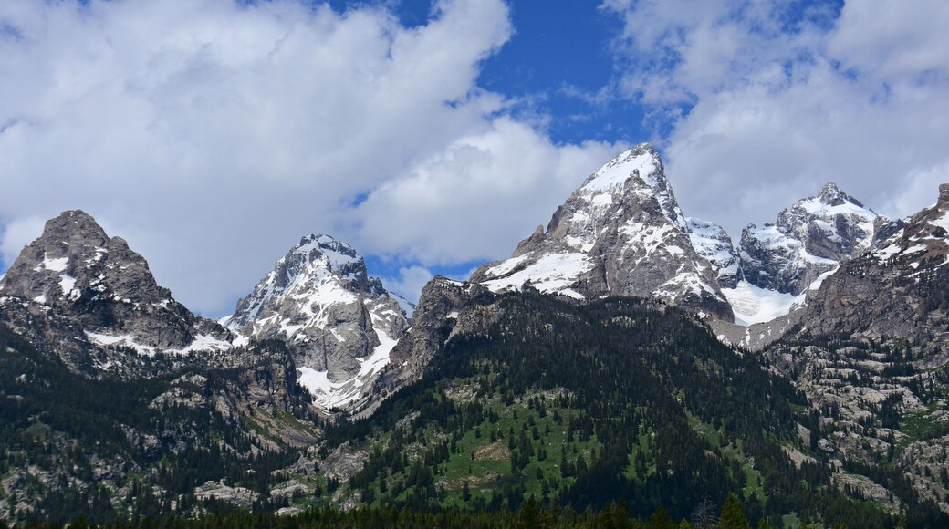the magnificent south tetotn, middle teton, and garnd teton peaks in summer in grand teton national park, wyoming