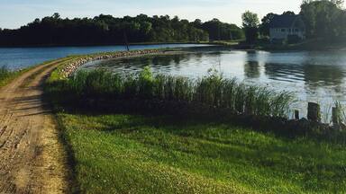 The road to grandpa's house bisects Lake Rachel. Summertime is simply beautiful in Minnesota. This area alone has over 200 lakes nearby.