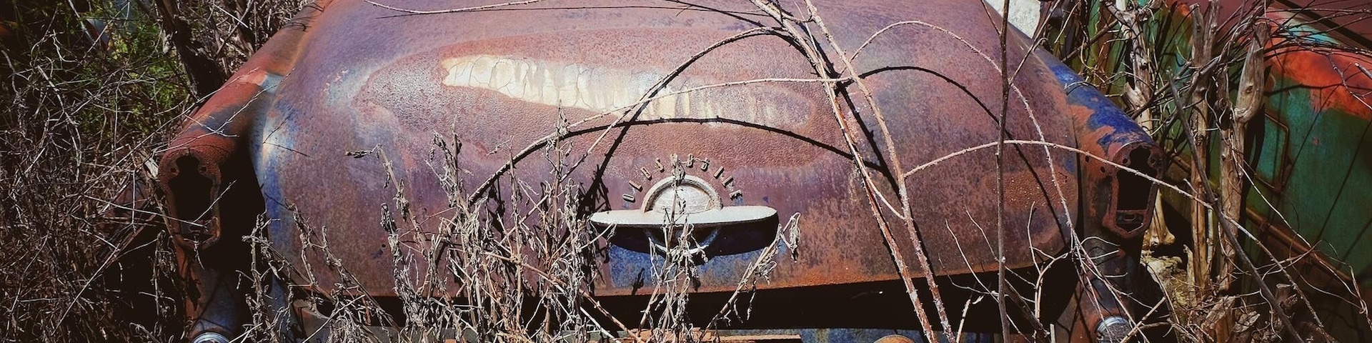 A old American classic car graveyard just off Highway 36 near 8110-8130 W 800 S, Modoc, IN 47358
