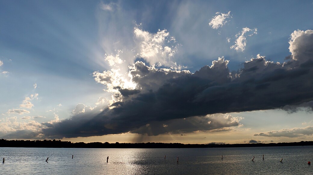 Backlit Evening Rain Shower over Medicine Lake in Plymouth, Minnesota