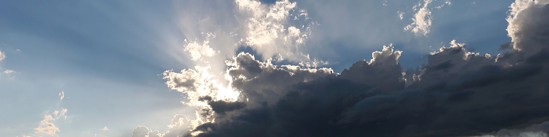 Backlit Evening Rain Shower over Medicine Lake in Plymouth, Minnesota