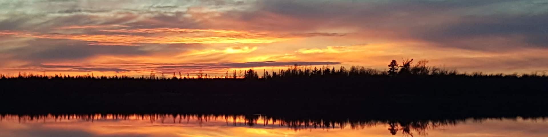 The view from our dock at the cabin taken November 15th, 2016. No wind, about 43 degrees. #CabinLife #LakeLife #Sunsets