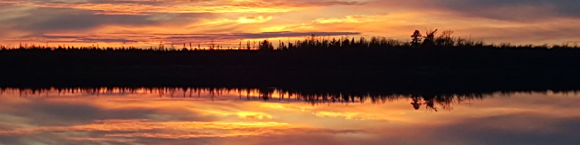 The view from our dock at the cabin taken November 15th, 2016.  No wind, about 43 degrees.  #CabinLife #LakeLife  #Sunsets