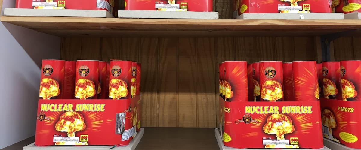 Shelves stocked with 'Nuclear Sunrise' fireworks.