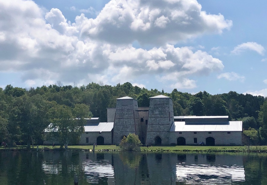 The blast furnaces at this historic park were in use between 1867-91. The site is located on Little Snail Shell bay on Lake Michigan. The area in front of the furnaces had docks in it when the site was active.