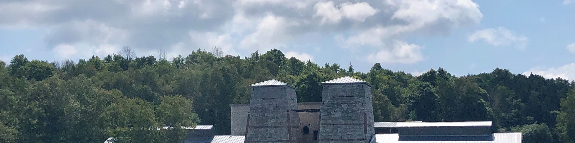 The blast furnaces at this historic park were in use between 1867-91. The site is located on Little Snail Shell bay on Lake Michigan. The area in front of the furnaces had docks in it when the site was active.
