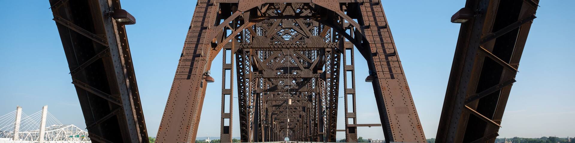 A large metal bridge with a complex truss structure.