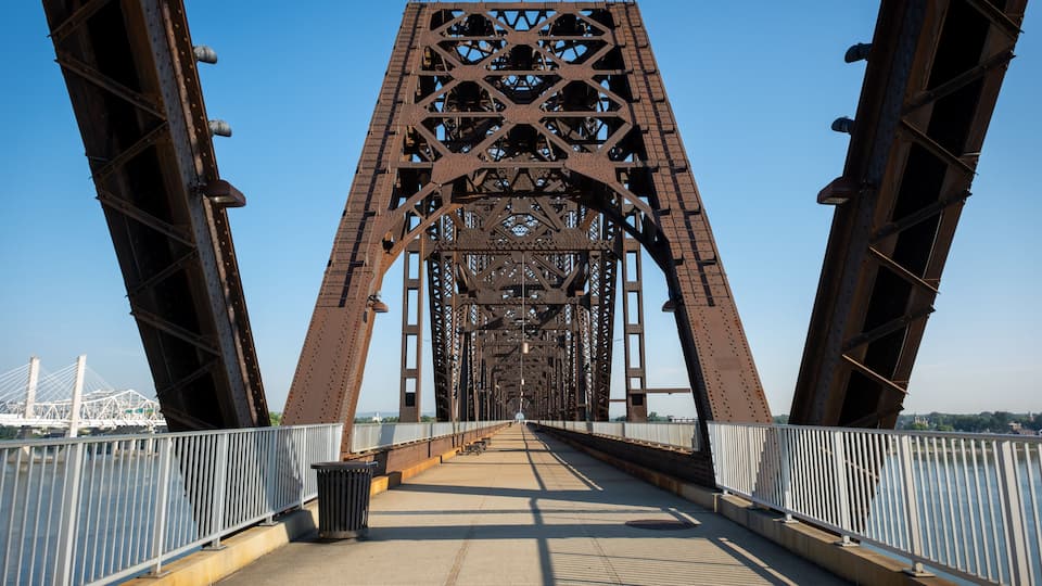 A large metal bridge with a complex truss structure.