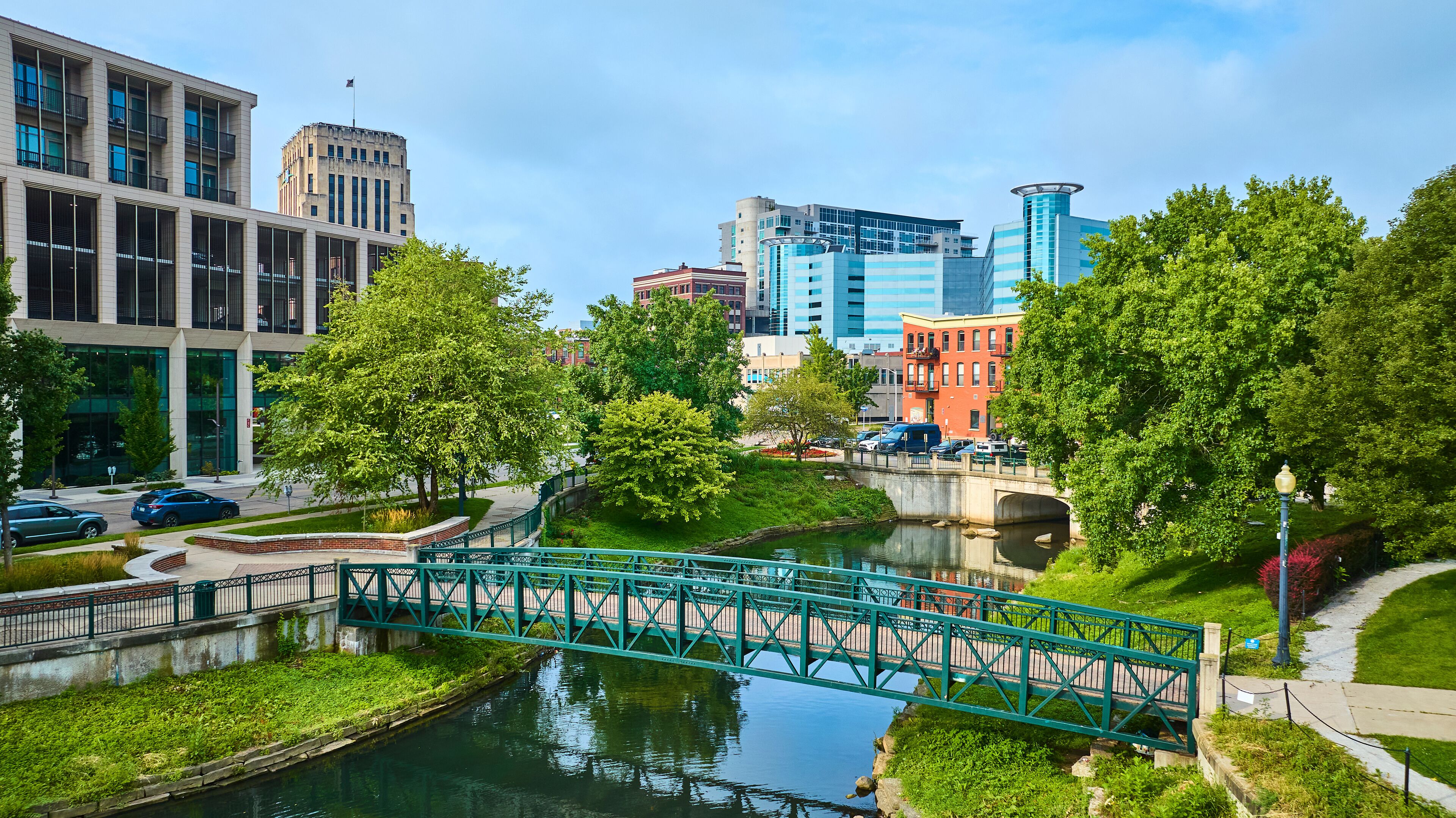 Aerial View of Green Pedestrian Bridge Over Arcadia Creek in Downtown Kalamazoo