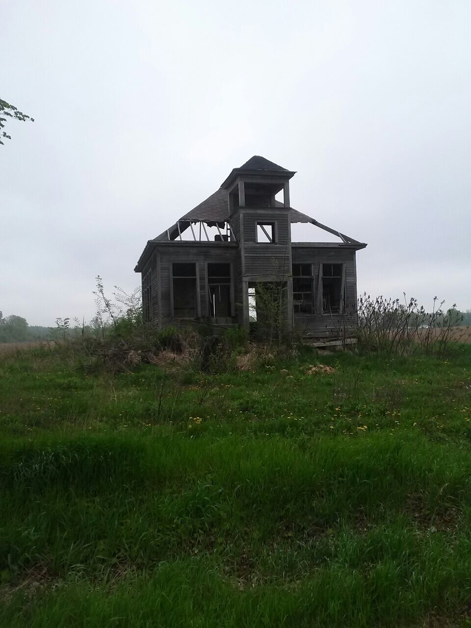 This abandoned school house is on it's last legs, unfortunately, with the floor caving in and ceiling falling apart, but it was honestly a beautiful sight. The waypoint is not correct.
