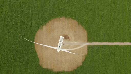 A wind generator surrounded by rows of corn.
#patterns