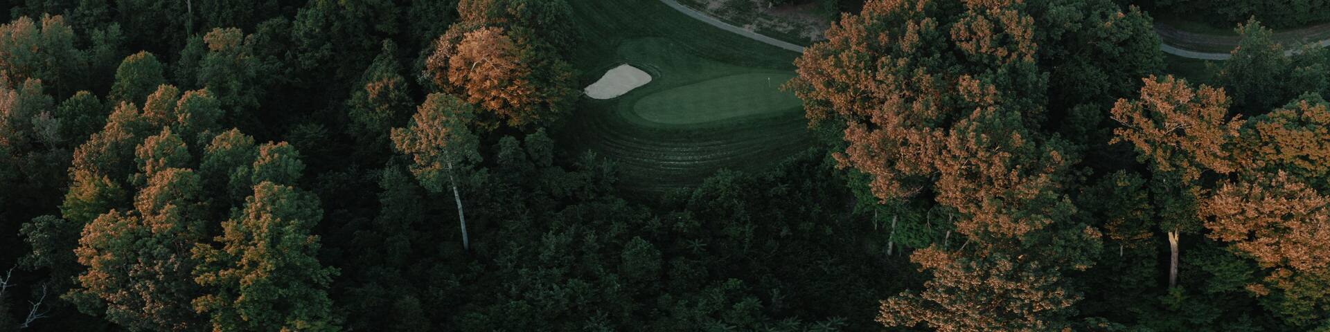 Aerial view of a green rural golf course in Otsego, Michigan