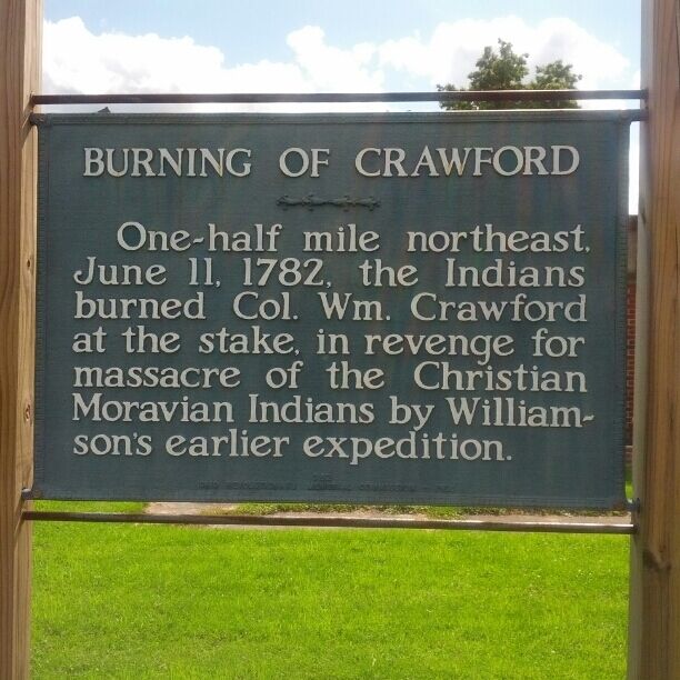 A historical sign about the Burning of Crawford.