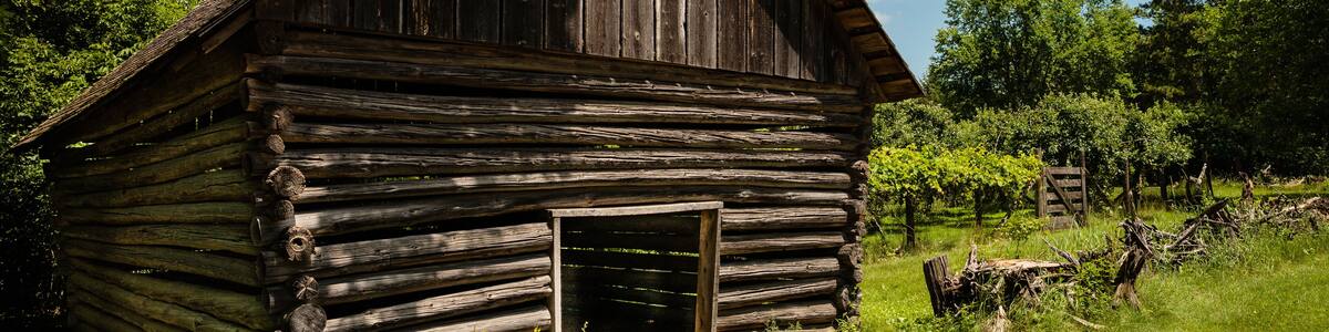 An old log drying builing at the edge of the Scandinavian Homestead area of Old World Wisconsin, Eagle, Wisconsin