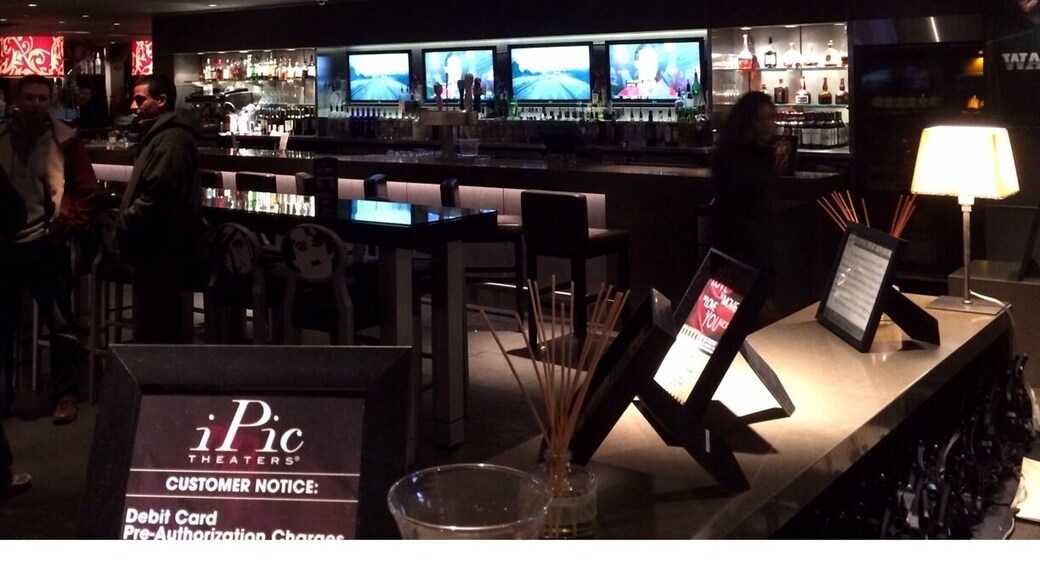 The best movie theater I've ever come across. The lobby includes a bar, free pool tables, and a fireplace. Theaters have bottle service, reclining seats, blankets, and pillows.