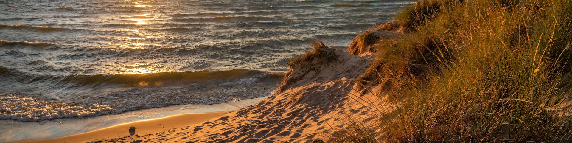 Gorgeous Sunset over the beach and sand dunes on Lake Michigan - Ludington at Stearns Park and Ludington State Park