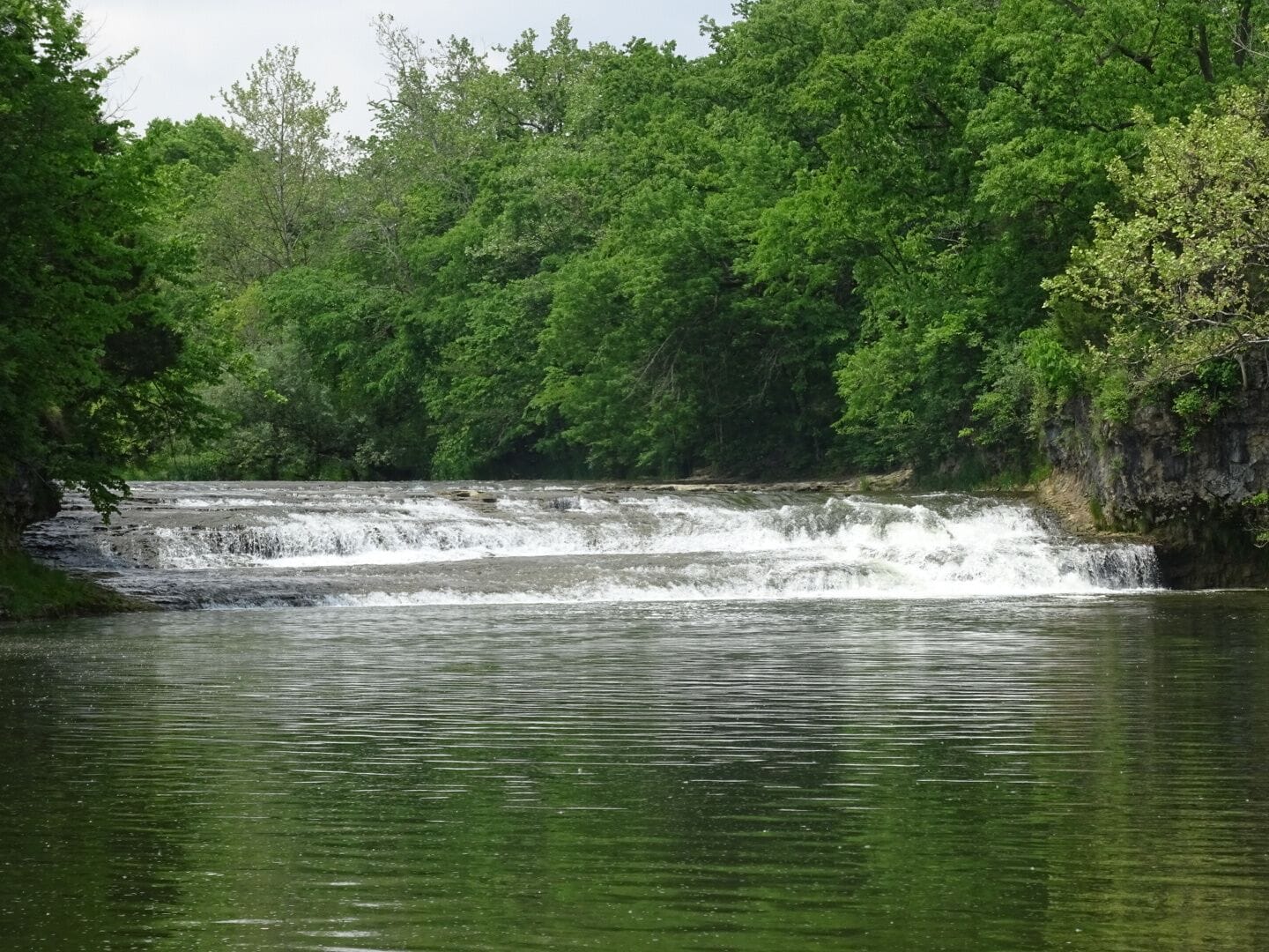 Greenville Falls State Scenic River Area is a 92-acre park on either side of Greenville creek with a 20-foot cascading fall and natural limestone arch.

also features ruins of historical interest, nearly a mile of trail, access to fishing spots, a limestone natural arch.