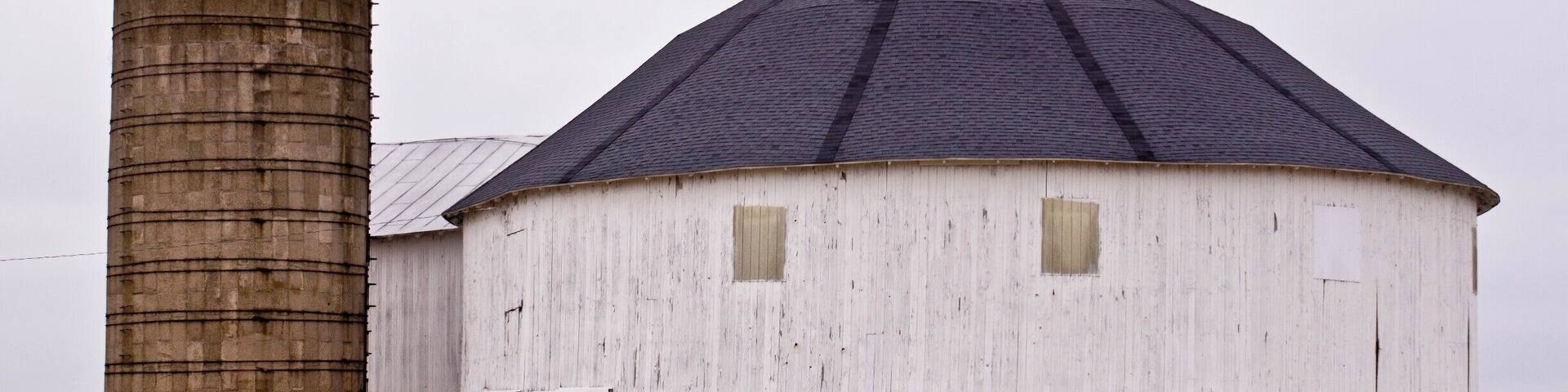 Just a short distance south of the new wind turbine farm I came across a round barn. There used to be a lot of those around here but they have slowly disappeared from the landscape. I only know of two others close. Sadly a large part of rural Indiana's history vanishing.