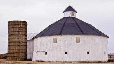 Just a short distance south of the new wind turbine farm I came across a round barn. There used to be a lot of those around here but they have slowly disappeared from the landscape. I only know of two others close. Sadly a large part of rural Indiana's history vanishing.