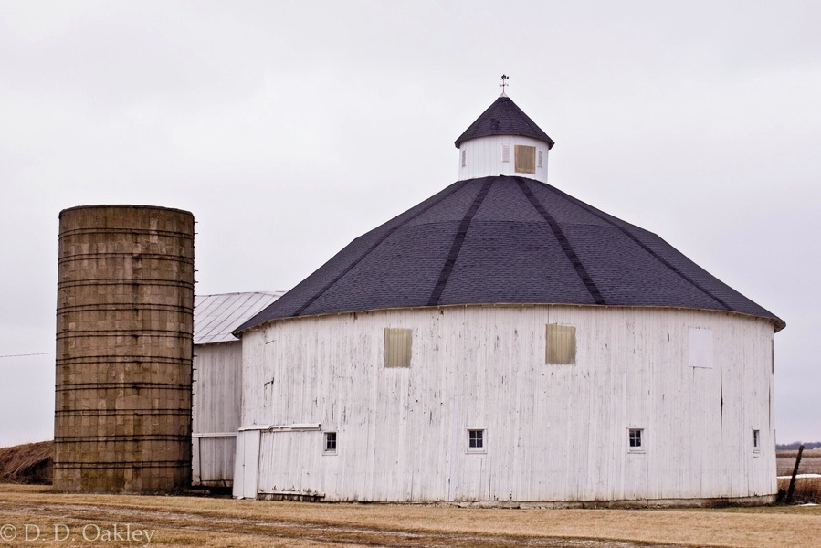 Just a short distance south of the new wind turbine farm I came across a round barn. There used to be a lot of those around here but they have slowly disappeared from the landscape. I only know of two others close. Sadly a large part of rural Indiana's history vanishing.