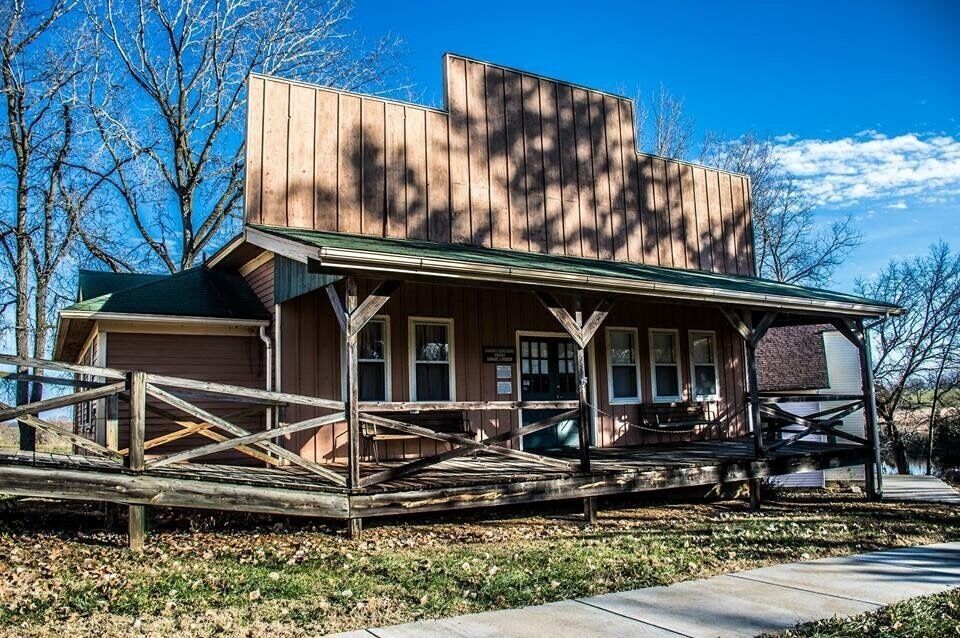 Step back in time and enjoy this little town pasted by time!! The Kilgour School was formed in 1869. The building was located about 4 miles southwest of Oskaloosa and the the  corner of 78th and Lincoln. It was moved to Oskaloosa in 1950 and became part of the elementary grade school complex (Grades 1-4), along with Plum Grove, Tibbott, and lumber from Lone Tree Schools. The combined Kilgour/Plum Grove building was relocated to Old Jefferson Town in 1975. Presently it houses the Jefferson Co. Genealogical Society Resource Center (Library).