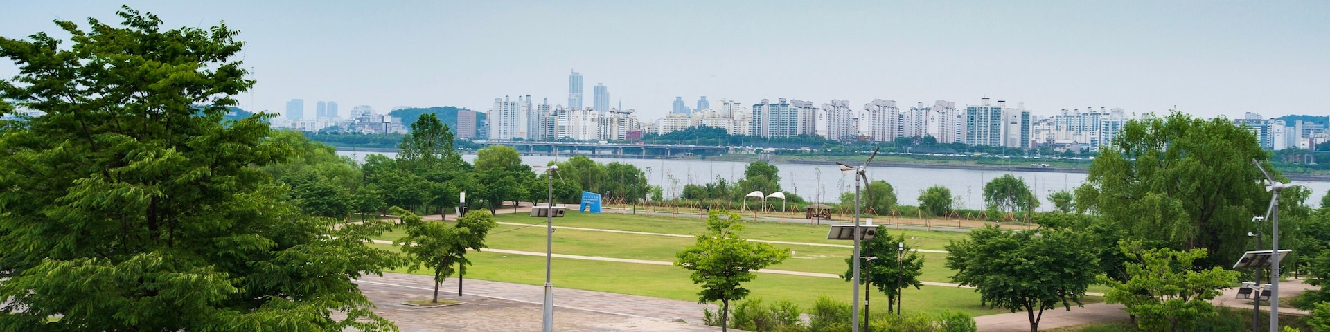 River Park view on a cloudy day with skylines of the other side of the river.