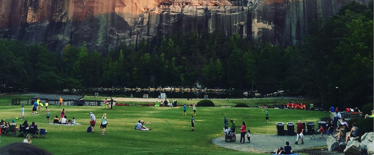 As one watches the sun set over Stone Mountain (controversial Confederate general monument and all), the color of the rock deepens and puts on a beautiful show ❤️ #bruisedpassports