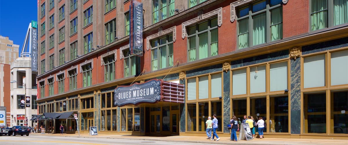 National Blues Museum featuring signage and street scenes
