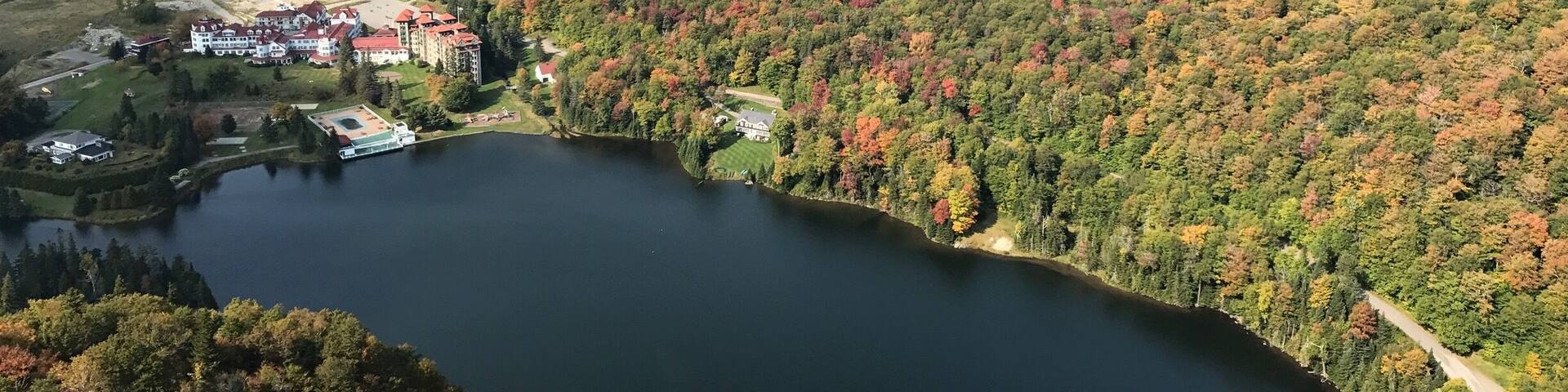 This is Table Rock Trail in northern New Hampshire. It's a short, but steep hike to the top. It takes about 30 minutes to get to the top with a couple of connecting trails as well. The view is breathtaking, as the color of the leaves are already starting to change for the season. Once at the top, you will find yourself on a rock formation several hundred feet above the a beautiful lake with endless mountains as far as the eye can see. If you ever have the chance, take the hour to reflect on all the beautiful things that were placed here for you to take in. Find your happy place, happy hiking!