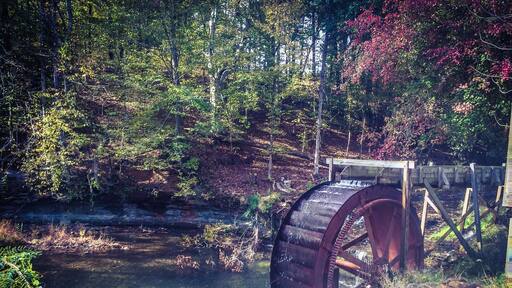 Grady's Mill, water wheel still turns and is located beside a small waterfall.