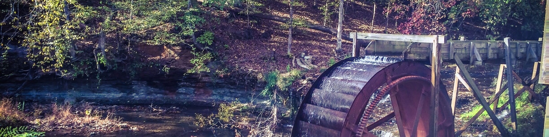Grady's Mill, water wheel still turns and is located beside a small waterfall.