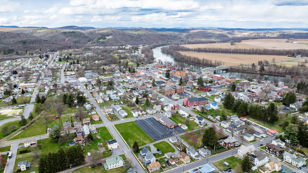Jersey Shore, PA, USA - 03-17-2024 - Cloudy winter / spring aerial image of the borough, downtown area of Jersey Shore, Pennsylvania.