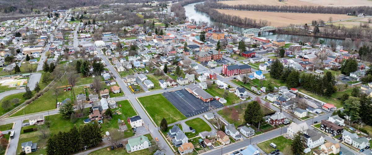Jersey Shore, PA, USA - 03-17-2024 - Cloudy winter / spring aerial image of the borough, downtown area of Jersey Shore, Pennsylvania.