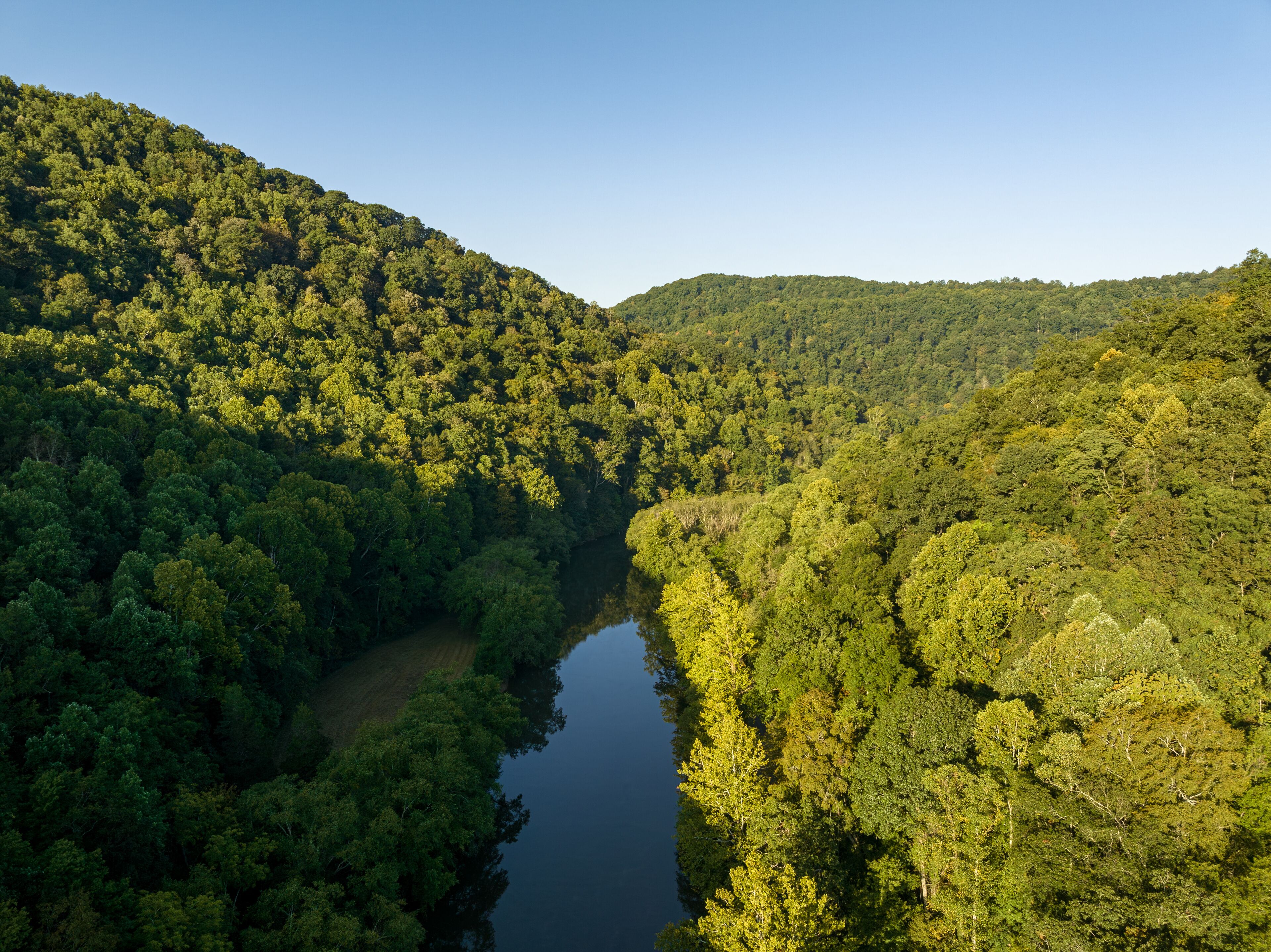 Aerial View of Forested Hills and River at Sutton Lake, West Virginia