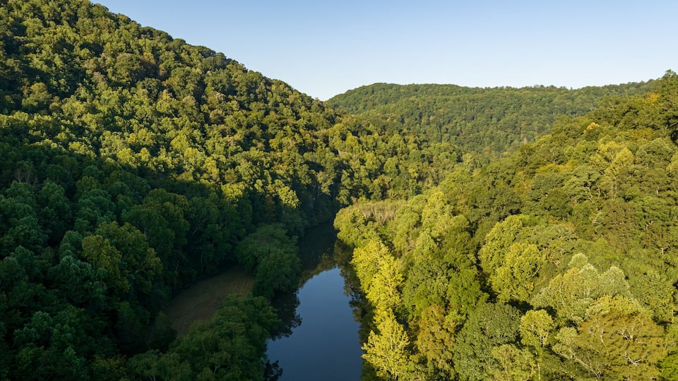 Aerial View of Forested Hills and River at Sutton Lake, West Virginia