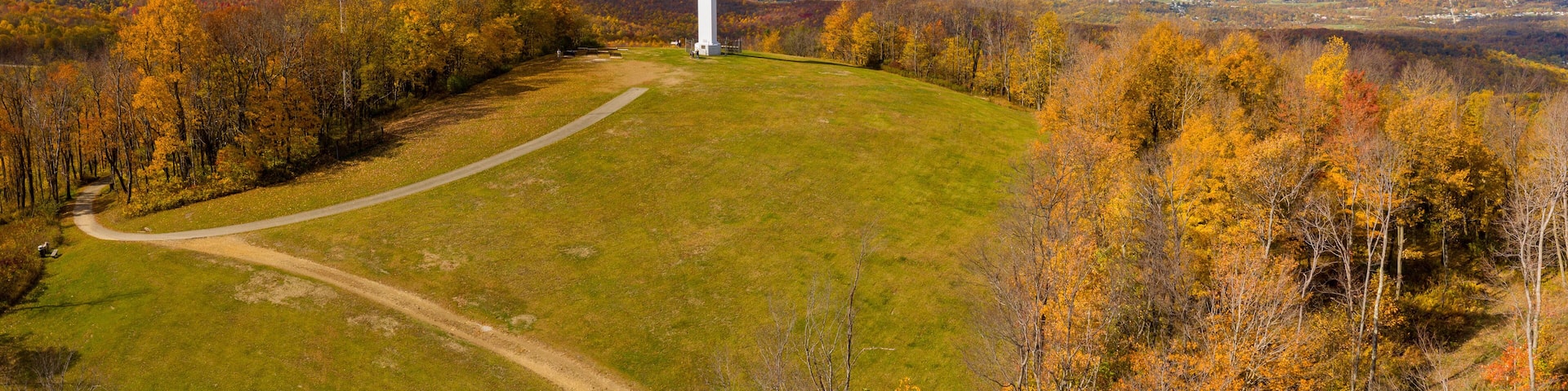 Aerial drone view of the metal structure of the Great Cross of Christ on Dunbar's Knob in Jumonville, PA