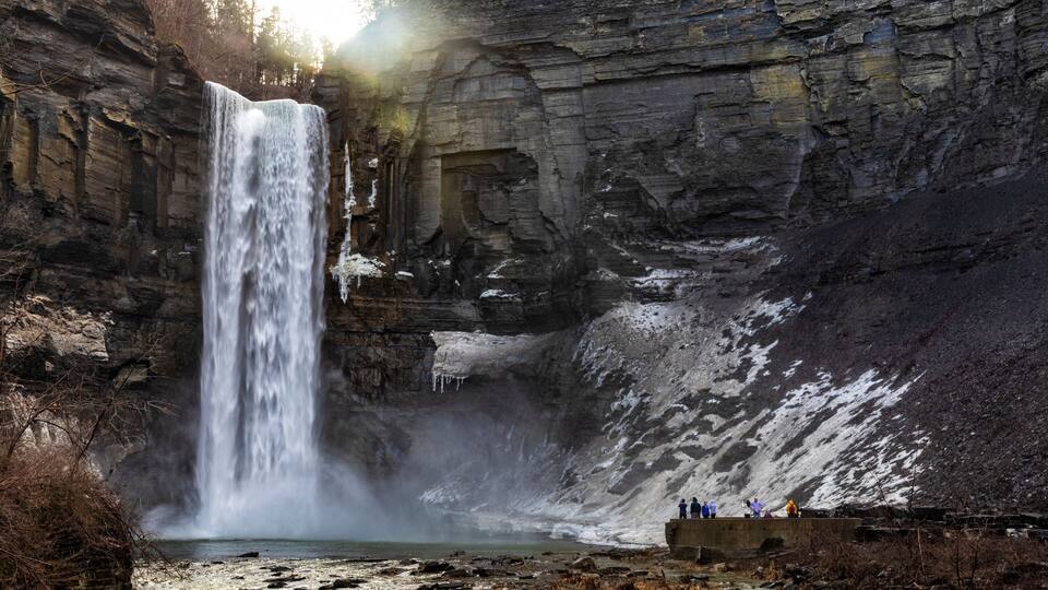 Taughannock Falls is a 215-foot plunge waterfall, that is the highest single-drop waterfall east of the Rocky Mountains, located about 10 miles north of Ithaca in New York State, USA, at winter.