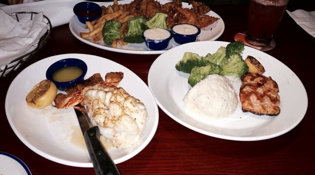 Delicious Red jumbo lobster tail, coconut prawn, baked salmon n french fries,