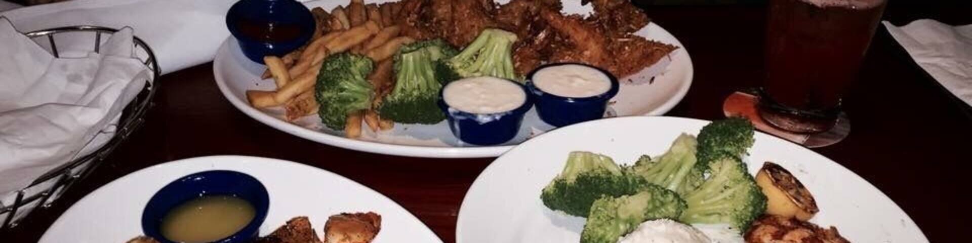 Delicious Red jumbo lobster tail, coconut prawn, baked salmon n french fries,