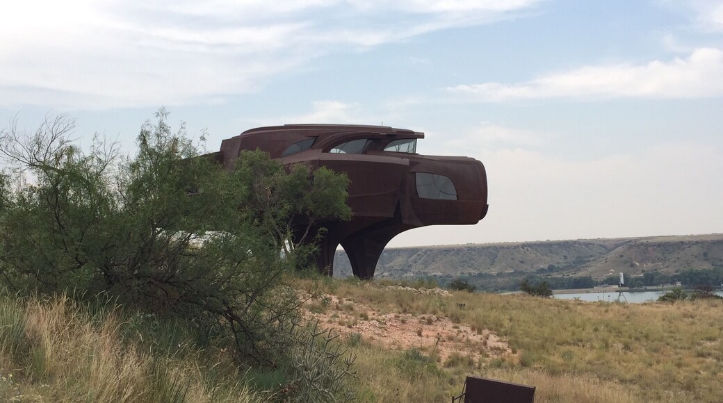 One of the most unique styled homes in the world, what looks like something straight out of a sci-fi movie is an unfinished project by the late sculptor and designer Robert Bruno. The home now sits vacant and looms over the vast waters of Ransom Canyon.
