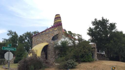 Another unique home built by the late, local designer and sculptor, Robert Bruno. It is located across the street from his futuristic steel house. This curvy array of stone and colored tile was constructed by Manfred Kaiter, who later married local rock icon, Buddy Holly's sister.