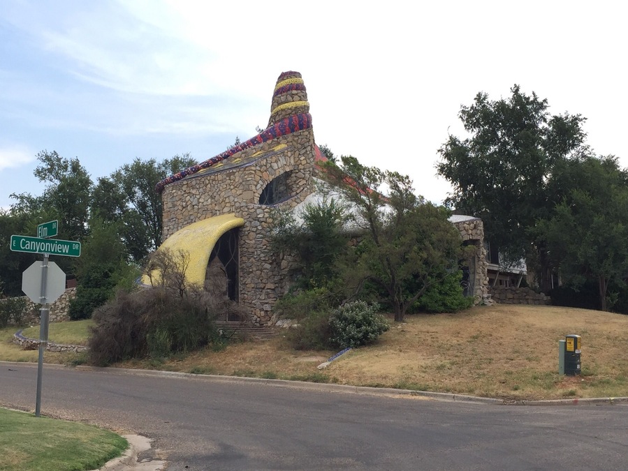 Another unique home built by the late, local designer and sculptor, Robert Bruno. It is located across the street from his futuristic steel house. This curvy array of stone and colored tile was constructed by Manfred Kaiter, who later married local rock icon, Buddy Holly's sister.