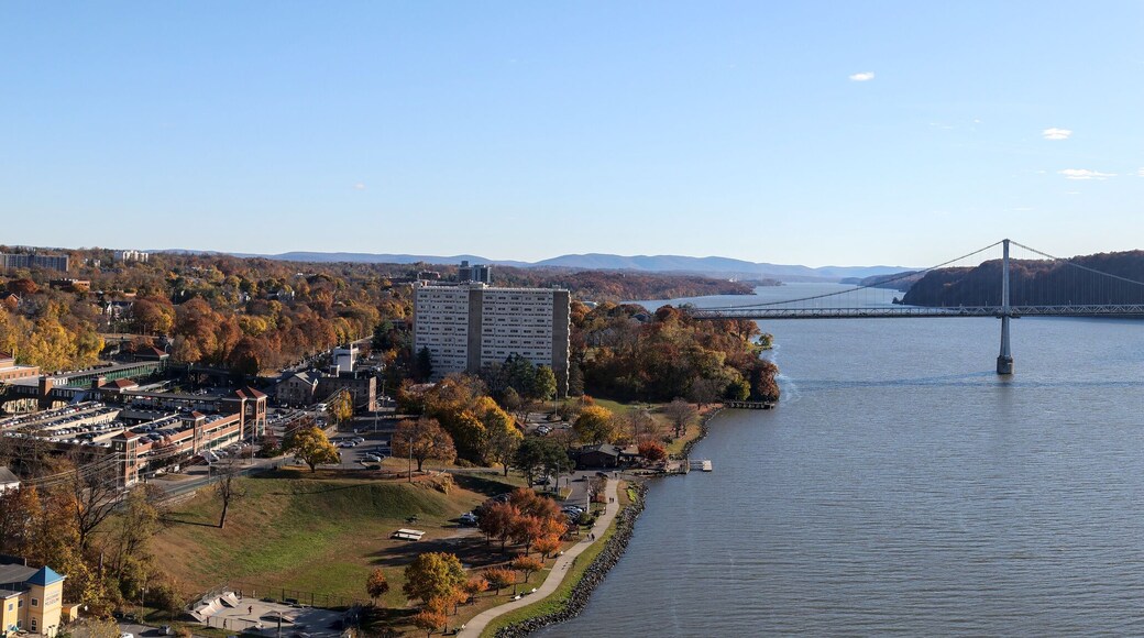 panoramic view of mid hudson bridge over hudson river valley (poughkeepsie, upstate new york) sunny day train station wide angle sun glare crossing suspension small town travel metro north