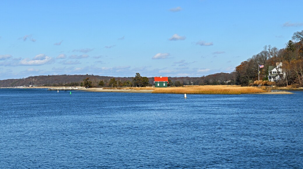 Autumn landscape with Gamecock Cottage, historic building, at Stony Brook in Brookhaven Town, in Suffolk County, New York, on Long Island
