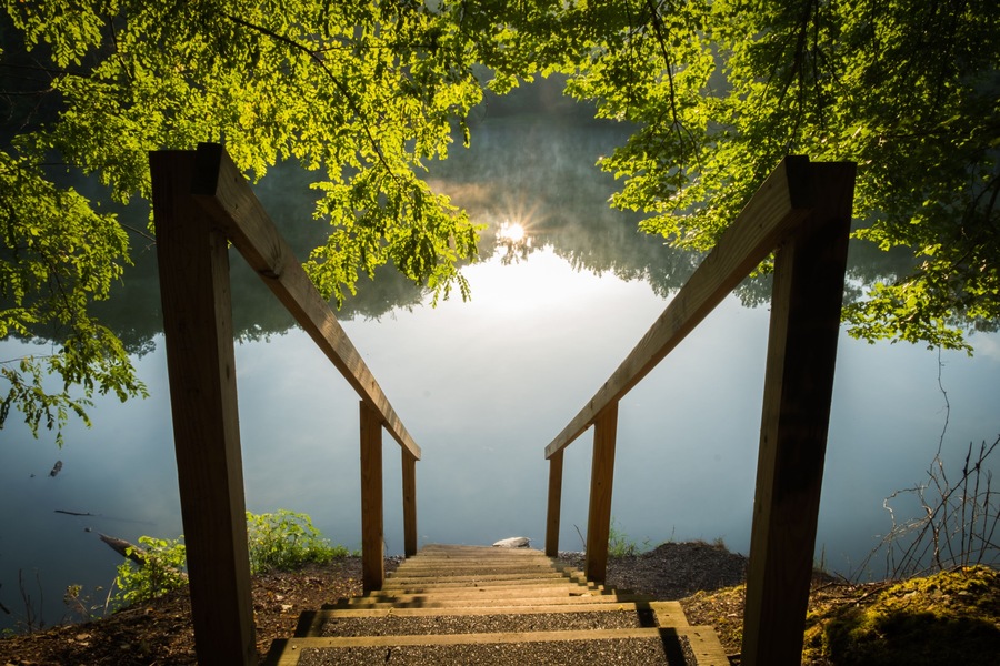 Beautiful reflection of the sunrise at Grundy Lakes Park in Tracy City, Tennessee of the South Cumberland State Park system.