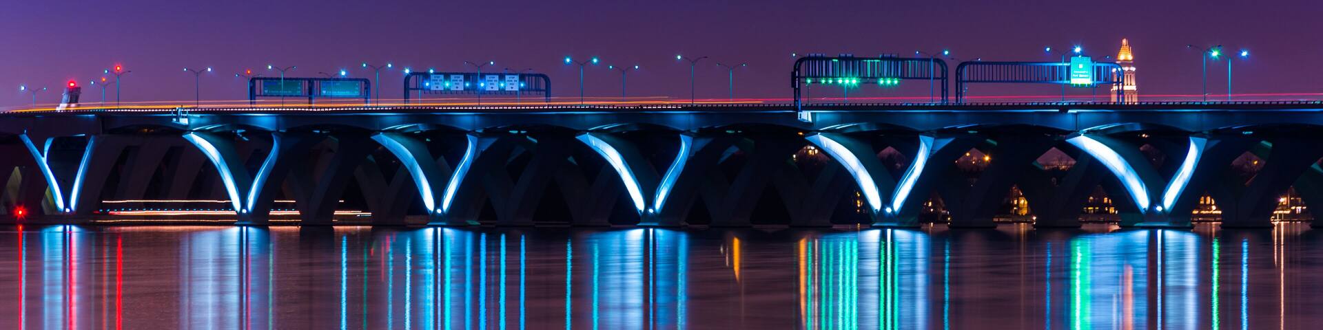 The Woodrow Wilson Bridge at night, seen from National Harbor, M