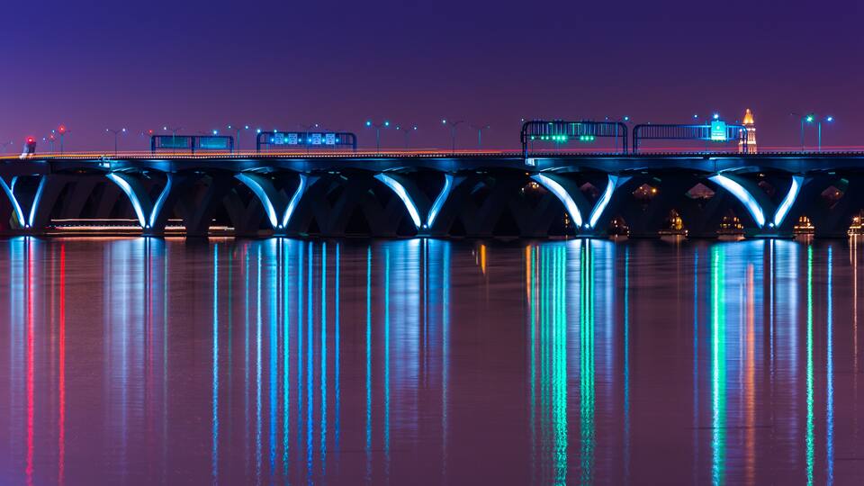 The Woodrow Wilson Bridge at night, seen from National Harbor, M